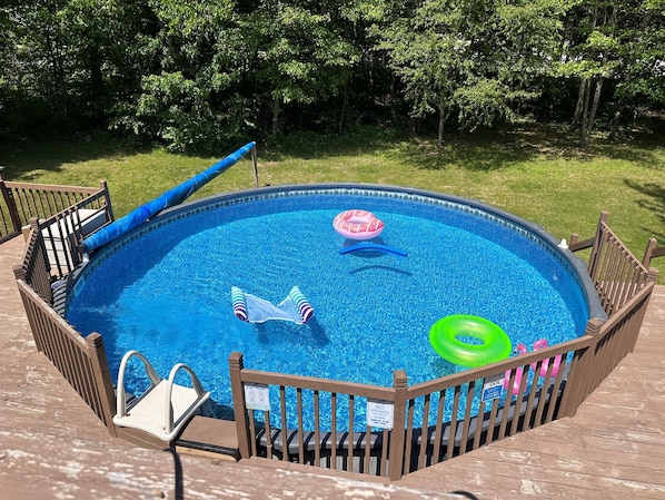 24' above ground heated pool, open from Memorial Day to Labor Day