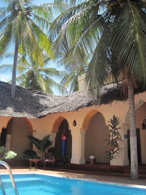 Under the coconut trees