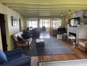 View from reading nook through living room and sun porch.