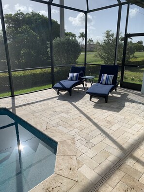 Padded Lounge chairs, pool sitting area