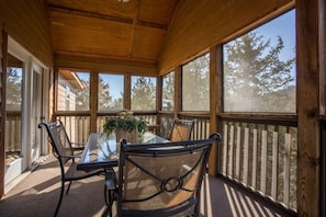 The screened porch can be a great place to have some breakfast and get fresh air