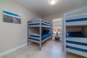 Two sets of twin bunk beds are a great place for friends, cousins and/or siblings to share the highlights of their Marco Island vacation.