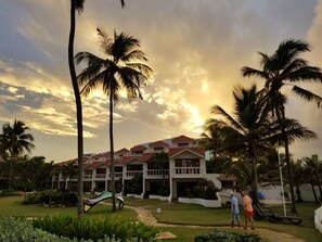 Sunset over the villas from the beach.