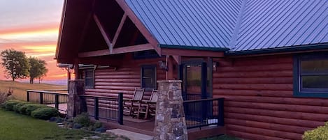 Beautiful authentic log cabin with stone accents 