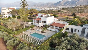 Villa Ma-Re in the yellow rectangular. Hersonissos port in the back 