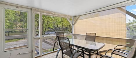 Enjoy the lovely front porch with a view and the sound of the river