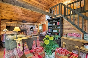 The cabin's interior boasts beautiful wood furnishings.
