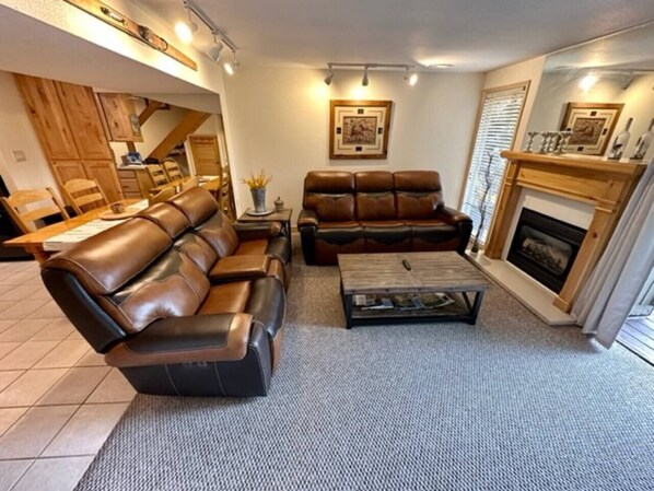 New leather couches in the living room.