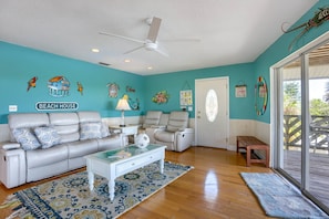 Spacious Living Room with New Leather Reclining Furniture