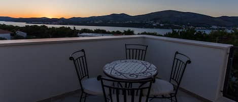 The panoramic sea view from terrace on the atic with outdoor seating