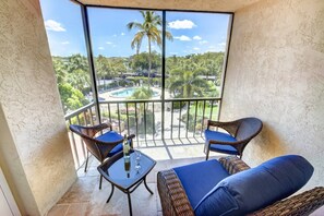 You can access the screened balcony from both the master bedroom and the living room.