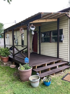 Guest room with full bed and breakfast in the Crooked House Gentry AR