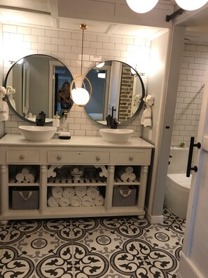 75 yr old buffet from a monastery in Oregon. I converted into a double vanity. 