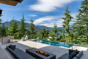 Infinity pool overlooks breathtaking views of Alpha Lake