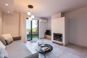 Aspect of living room 
fireplace and pool view