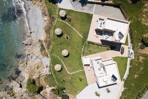 A birds eye view of the property and the private beach!