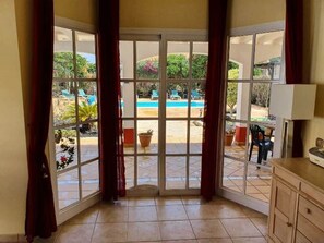 Patio Doors leading out to Pool and Patio Area