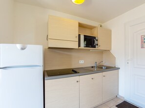 Prepare a small meal in your kitchenette.