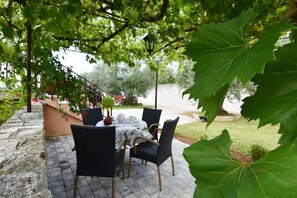 The private terrace with garden furniture near the apartment