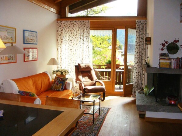 living room with chimney