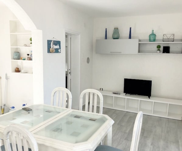 Dining and living room area, with spectacular view of the sea and mountains.