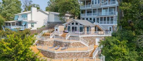 4 story lakehouse with giant multi-level patio and boat dock