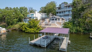 4 story lakehouse with giant multi-level patio and boat dock