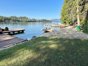 Grass and beach area by the dock 