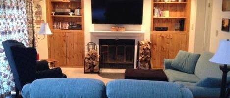 Living Space with a wood burning fireplace. We provide the wood.