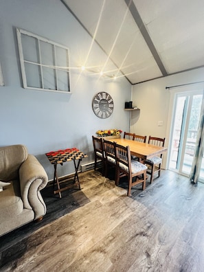 Dining area and sliding doors out to the upstairs deck.