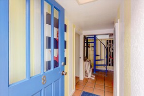 entry hall and bottom of spiral staircase