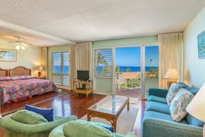 Living Area - A Breeze from the ocean with some  Kauai Coffee in the living area, is a great way to start the day.