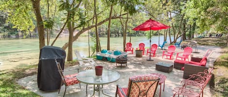 Concrete pad at the waters edge with ample seating, propane grill, and direct river access.
Paddle Boat was swept away in flood, no longer available.