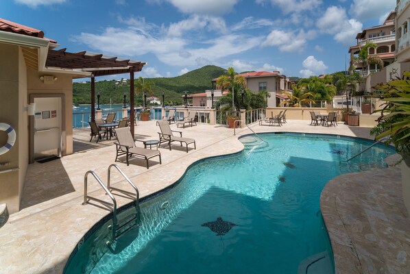 Grande Bay Resort pool deck. New addition not shown are 3 large shade umbrellas