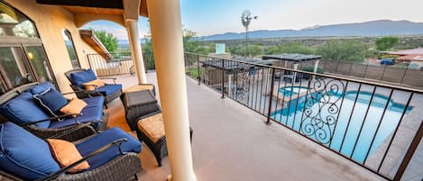 Upstairs Deck With A Relaxing View Of The Pool And Mountains