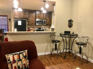 Open concept kitchen, living room, and dining room. Great for entertainment!