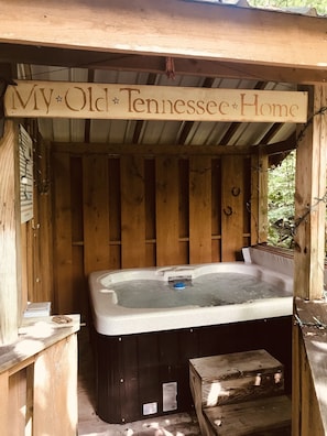 Secluded hot tub on private back porch