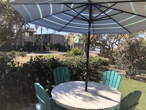 Enjoy relaxing on your ocean view private patio with adjoining grassy area!