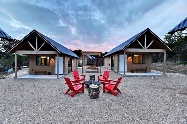 The Courtyard Cabins offer communal hot tubs and a fire pit