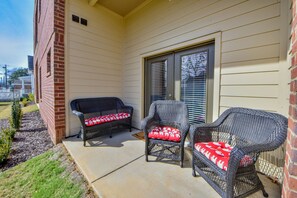 Back Patio - There is outdoor seating on the back patio where you can enjoy the Alabama weather.