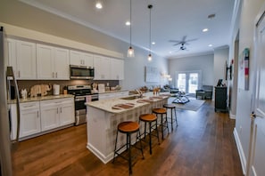 Kitchen - This gorgeous kitchen has everything you need to make game day or tailgating snacks.