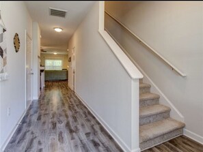 Entry view of hallway and stairs 