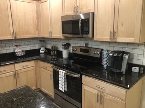 Fully stocked kitchen with keurig, coffee and all cooking utensils!