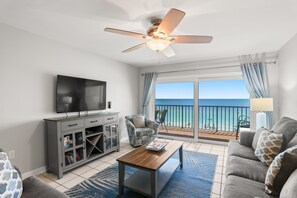 Living Room with Sleeper Sofa and Balcony Access