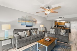 Living Room with Sleeper Sofa and Balcony Access