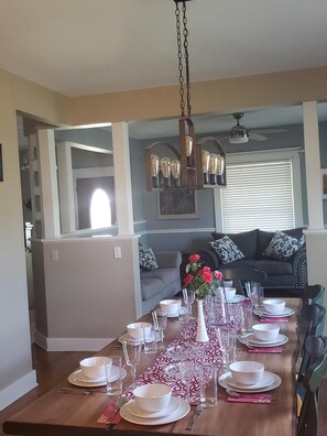 Dining room- plenty of place settings and serving dishes