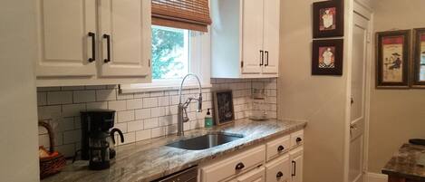 New Granite and Subway tile ! Updated all appliances and electrical ! New Sink !
