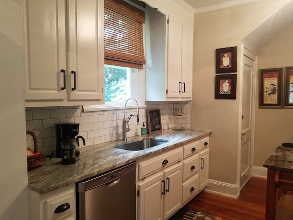 New Granite and Subway tile ! Updated all appliances and electrical ! New Sink !