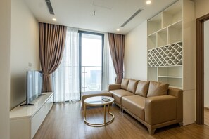 Livingroom with leather sofa/ internet tv/ skyview and a big logia