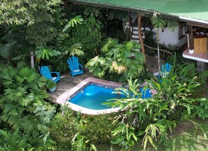 Open air home puts you close to nature. All bedrooms screened in with fans